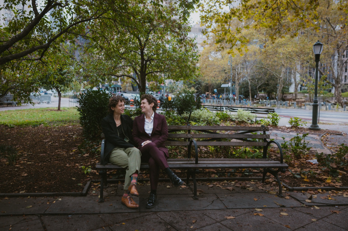 Katie and Anna on a park bench